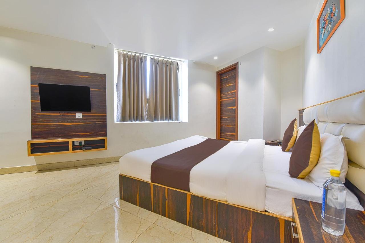 Fabhotel Prime Kaki
